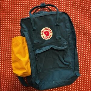 Kånken Green Backpack with Yellow Accessories